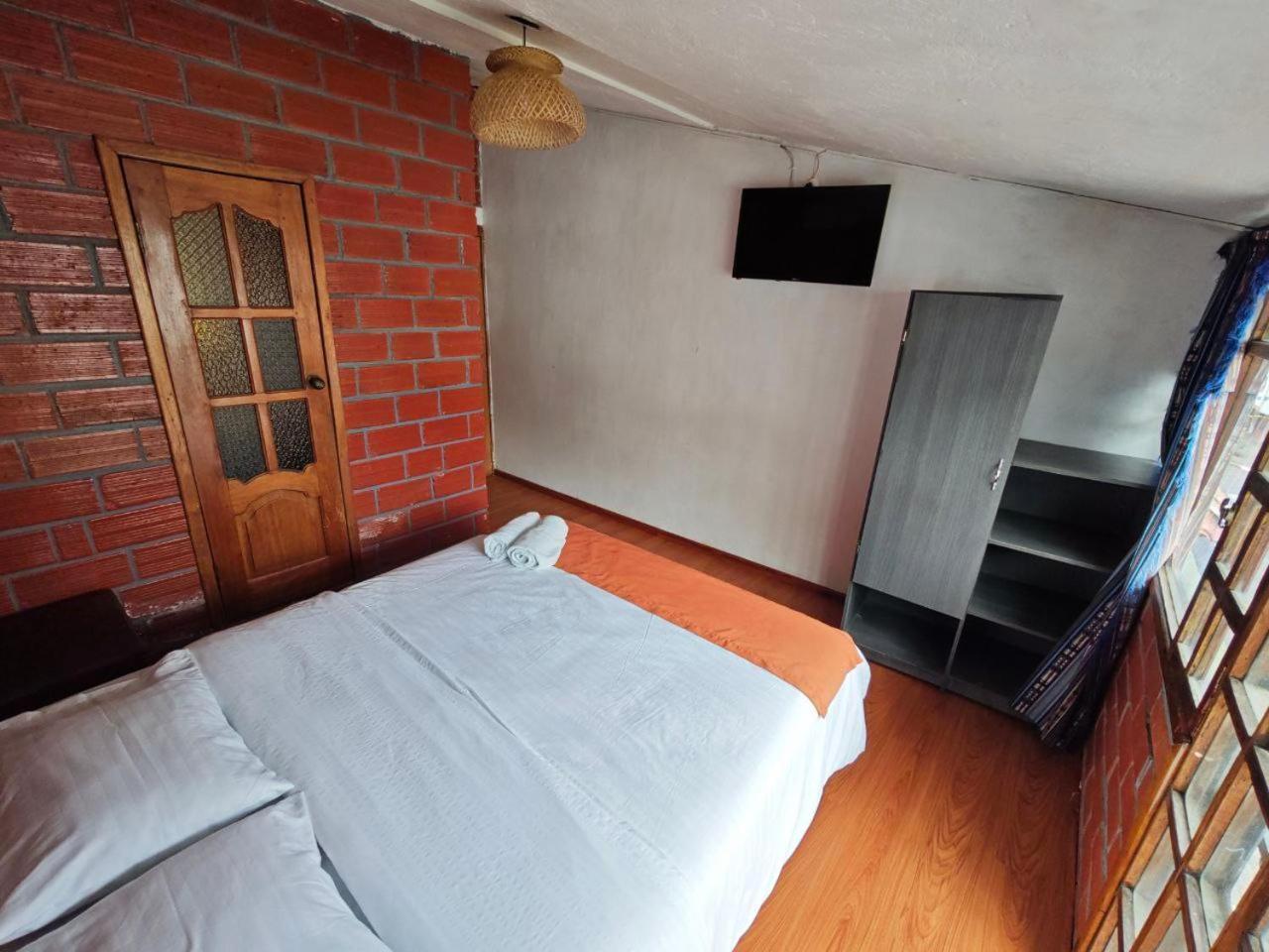 Garden House Hostal Banos  Exterior photo